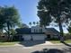 Charming two-story home featuring a well-manicured lawn and mature trees, complemented by a spacious driveway at 14622 N 45Th Pl, Phoenix, AZ 85032