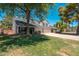 Charming two-story home featuring mature trees, well-manicured lawn, and an attached three car garage at 14622 N 45Th Pl, Phoenix, AZ 85032