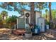 Charming backyard shed with a decorative wreath, providing extra storage and character to the property at 14622 N 45Th Pl, Phoenix, AZ 85032