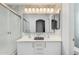 Clean bathroom features double sinks, modern fixtures, and glass enclosed shower at 14885 W Ashland Ave, Goodyear, AZ 85395
