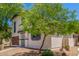 Inviting two-story home featuring low maintenance landscaping and a charming brick facade at 14885 W Ashland Ave, Goodyear, AZ 85395