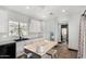 Open kitchen features a large center island, granite countertops, and a stylish backsplash at 14885 W Ashland Ave, Goodyear, AZ 85395