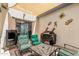 Outdoor patio with comfortable seating, BBQ, decor, and shade covering at 14885 W Ashland Ave, Goodyear, AZ 85395