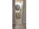 Powder bathroom showcasing pedestal sink and tile floors at 15861 W Westview Dr, Goodyear, AZ 85395