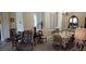 Dining room with shuttered windows and set table at 15861 W Westview Dr, Goodyear, AZ 85395