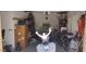 Garage featuring motorcycle and storage at 15861 W Westview Dr, Goodyear, AZ 85395