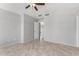 Neutral bedroom with tile floor and entry to another room at 16626 N 20Th St, Phoenix, AZ 85022