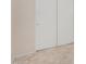 Neutral wall paint with white sliding closet door and tile floor at 16626 N 20Th St, Phoenix, AZ 85022