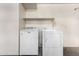Garage laundry area featuring new white washer and dryer at 16626 N 20Th St, Phoenix, AZ 85022