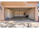 Spacious garage interior with washer, dryer, and water heater at 16626 N 20Th St, Phoenix, AZ 85022