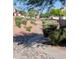 The greenbelt area showcases desert landscaping with a meandering sidewalk perfect for leisure walks at 16626 N 20Th St, Phoenix, AZ 85022