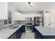 Beautiful kitchen with stainless steel appliances, an island, and stylish two-tone cabinetry at 16626 N 20Th St, Phoenix, AZ 85022