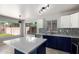Modern kitchen featuring an island, stainless steel appliances, and stylish cabinetry at 16626 N 20Th St, Phoenix, AZ 85022