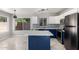 Modern kitchen with stainless steel appliances, quartz counters, island and ample cabinet space at 16626 N 20Th St, Phoenix, AZ 85022