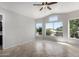 Bright primary bedroom featuring tile flooring and several large windows offering natural light at 16626 N 20Th St, Phoenix, AZ 85022