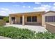 Backyard covered patio perfect for outdoor dining and relaxation at 17009 W Eureka Springs Dr, Surprise, AZ 85387