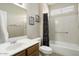 Bathroom features a vanity and a shower-tub combination at 17009 W Eureka Springs Dr, Surprise, AZ 85387
