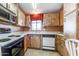 Functional kitchen featuring updated appliances and ample cabinet space at 17200 W Bell Rd # 2162, Surprise, AZ 85374