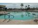 Relaxing community pool with lounge chairs and shade offering the perfect spot for leisure and socializing at 17200 W Bell Rd # 2162, Surprise, AZ 85374