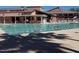 Community swimming pool with lap lanes, perfect for exercise and recreation on a sunny day at 17200 W Bell Rd # 2162, Surprise, AZ 85374