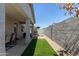 Backyard patio and low maintenance artificial grass at 17338 W Via De Luna Dr, Surprise, AZ 85387