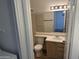 Bathroom featuring wood cabinets and sink at 1825 W Ray Rd # 1008, Chandler, AZ 85224