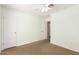 Bedroom with carpet, a closet and a ceiling fan at 19206 N 40Th St, Phoenix, AZ 85050