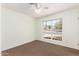 This bedroom features natural light and neutral carpet at 19206 N 40Th St, Phoenix, AZ 85050
