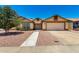 Charming single-story home with a two-car garage, manicured landscaping, and a welcoming walkway at 19206 N 40Th St, Phoenix, AZ 85050