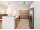 Functional kitchen with stainless steel appliances, ample cabinetry, and a breakfast bar at 19206 N 40Th St, Phoenix, AZ 85050