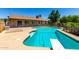Backyard pool with diving board and greenery at 19206 N 40Th St, Phoenix, AZ 85050