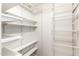 Walk-in closet with an organized shelving system for maximum storage at 19206 N 40Th St, Phoenix, AZ 85050