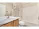 Bathroom with a shower/tub combo, toilet, and sink with vanity at 2018 N 104Th Dr, Avondale, AZ 85392