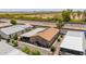 Aerial shot of a home with a covered patio, solar panels, and desert landscaping at 2263 N Trekell Rd # 159, Casa Grande, AZ 85122