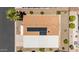 Birds eye view of home with solar panels, covered parking and minimal landscaping at 2263 N Trekell Rd # 159, Casa Grande, AZ 85122