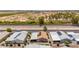Aerial view of manufactured home featuring desert backyard, solar panels, and car parking at 2263 N Trekell Rd # 159, Casa Grande, AZ 85122