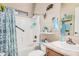 Bright bathroom with a shower-tub combo, featuring unique decorative elements for added charm at 2263 N Trekell Rd # 159, Casa Grande, AZ 85122