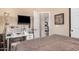 Comfortable bedroom with adjacent working area and an ensuite bathroom with modern finishes at 2263 N Trekell Rd # 159, Casa Grande, AZ 85122