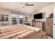 Comfortable bedroom featuring a ceiling fan, large window and a spacious closet for storage at 2263 N Trekell Rd # 159, Casa Grande, AZ 85122