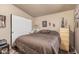 Tranquil bedroom with a sliding-door closet, offering both style and practicality at 2263 N Trekell Rd # 159, Casa Grande, AZ 85122