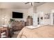 Cozy bedroom with a TV, ensuite bathroom, and a comfortable seating area for relaxing at 2263 N Trekell Rd # 159, Casa Grande, AZ 85122