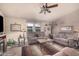 Relaxing living room with cozy furniture, a ceiling fan, and a warm lamp, perfect for unwinding at 2263 N Trekell Rd # 159, Casa Grande, AZ 85122