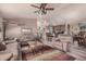 Inviting living room with an open floor plan that seamlessly connects to the kitchen and dining area at 2263 N Trekell Rd # 159, Casa Grande, AZ 85122