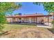 Spacious backyard with covered patio, perfect for outdoor dining and entertaining at 2324 E Crescent Ave, Mesa, AZ 85204