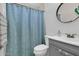 Bathroom featuring subway tile surround, updated vanity, and modern fixtures at 2324 E Crescent Ave, Mesa, AZ 85204