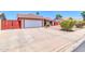 Charming single story home featuring a well-kept front yard and a two-car garage at 2324 E Crescent Ave, Mesa, AZ 85204