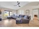 Spacious living room with vaulted ceilings, hardwood floors, and ample natural light at 2324 E Crescent Ave, Mesa, AZ 85204