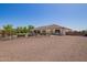 Backyard features a fenced pool and view of home at 24840 S 195Th St, Queen Creek, AZ 85142