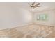 Bedroom with neutral carpet and one window providing natural light at 24840 S 195Th St, Queen Creek, AZ 85142