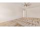 Bedroom with neutral carpet and a ceiling fan, showcasing natural light at 24840 S 195Th St, Queen Creek, AZ 85142